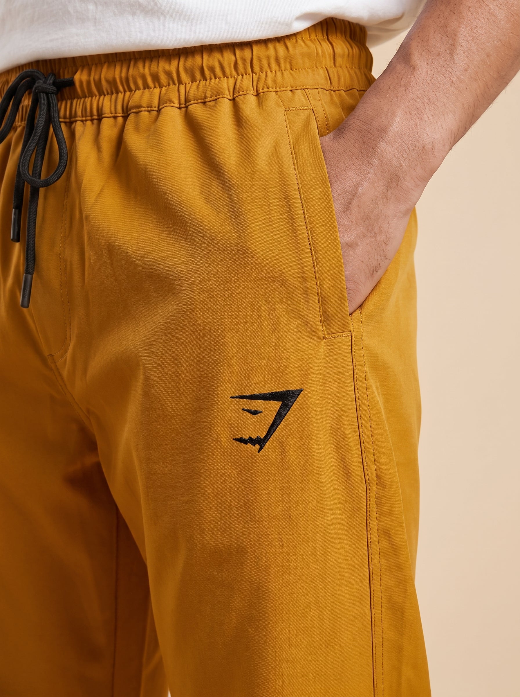 Gymshark Performance Track Pants – Mustard Gold