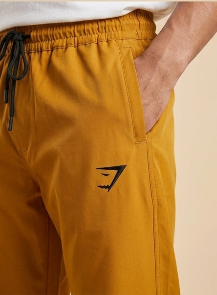 Gymshark Performance Track Pants – Mustard Gold
